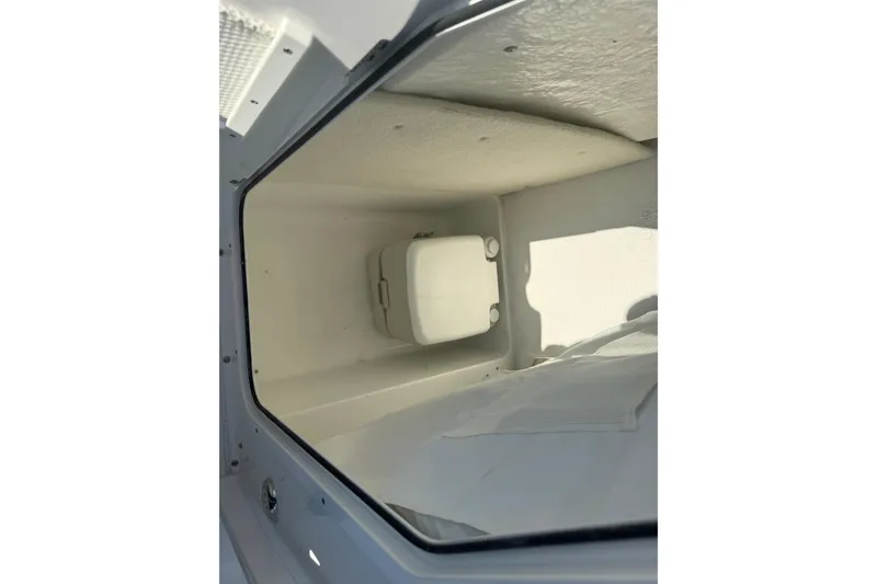 Slide: The Image of Interior storage compartment of 2026 Sea Hunt Ultra 229 boat. - 24