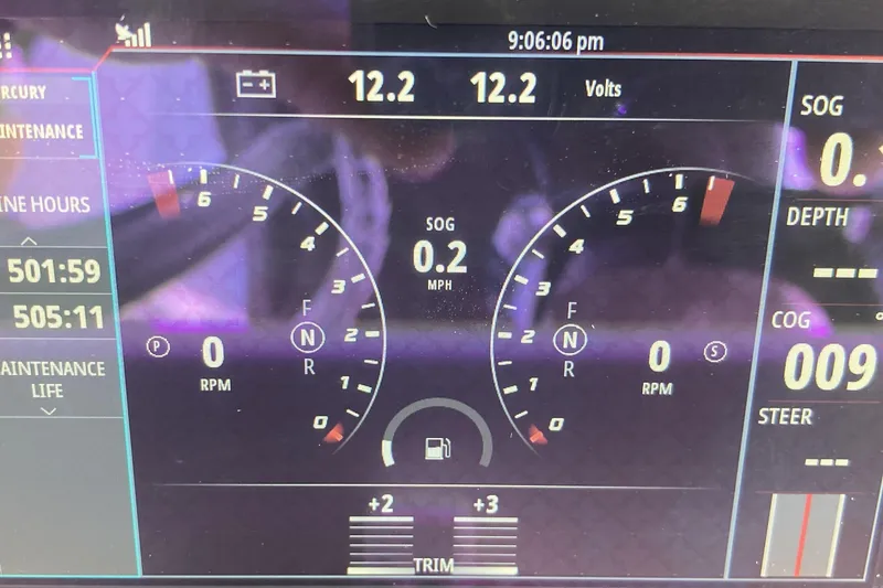 Slide: The Image of Dashboard of 2020 Invincible 33 Open Fisherman showing engine metrics and voltmeter. - 15