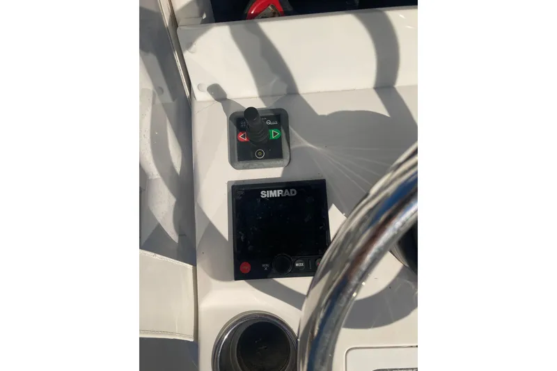 Slide: The Image of Control panel of 2020 Invincible 33 Open Fisherman with Simrad display. - 18