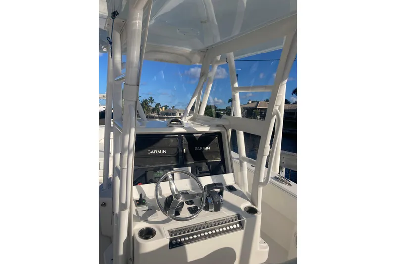 Slide: The Image of 2020 Invincible 33 Open Fisherman boat console with Garmin navigation system. - 22