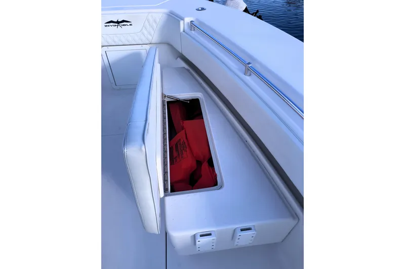 Slide: The Image of 2020 Invincible 33 Open Fisherman boat with open storage compartment. - 31
