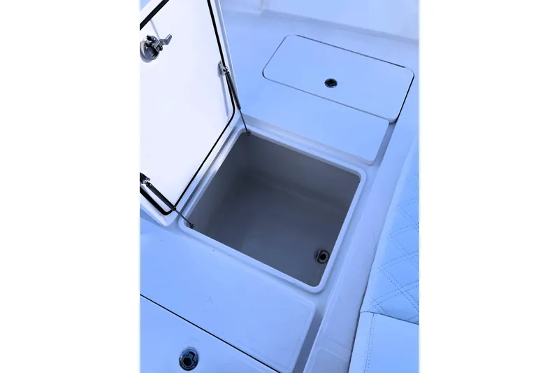 Slide: The Image of Open storage compartment on 2020 Invincible 33 Open Fisherman boat. - 36