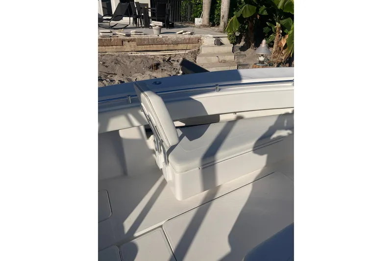 Slide: The Image of 2020 Invincible 33 Open Fisherman boat interior with seating and deck details. - 39