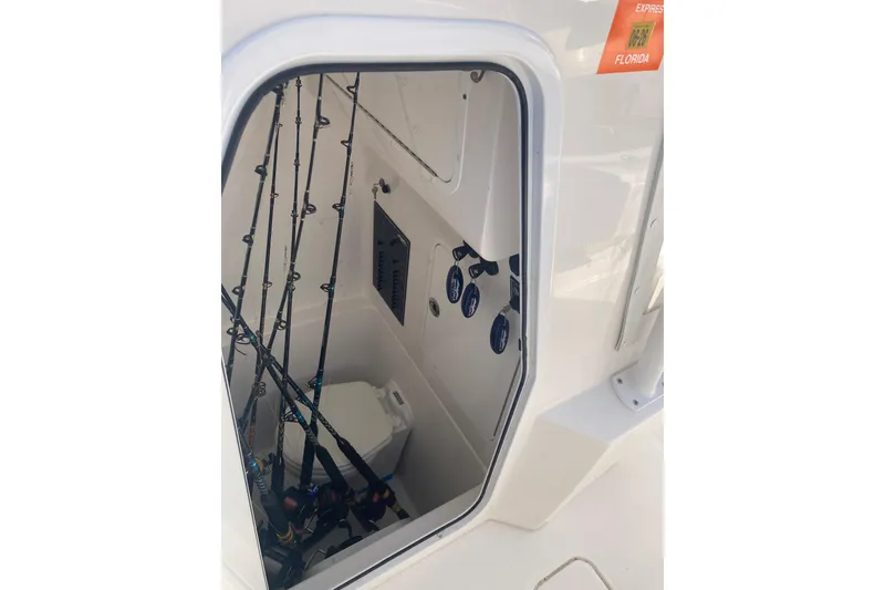 Slide: The Image of Interior view of 2020 Invincible 33 Open Fisherman boat with fishing rods and equipment. - 40