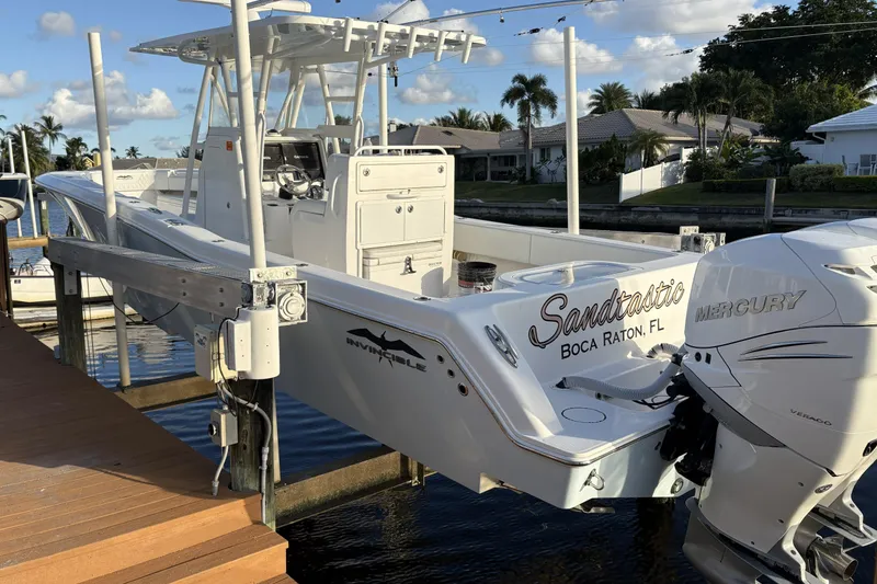 Slide: The Image of 2020 Invincible 33 Open Fisherman boat docked, featuring Mercury engines, in Boca Raton, FL. - 5