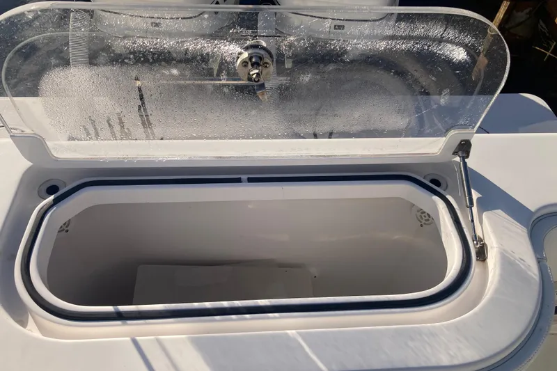 Slide: The Image of Open storage compartment on 2020 Invincible 33 Open Fisherman boat. - 52
