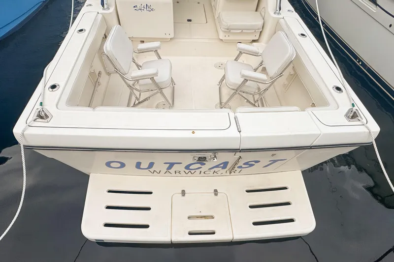 Slide: The Image of 2002 Pursuit 3000 Express boat with seating, docked in Warwick, RI. - 14