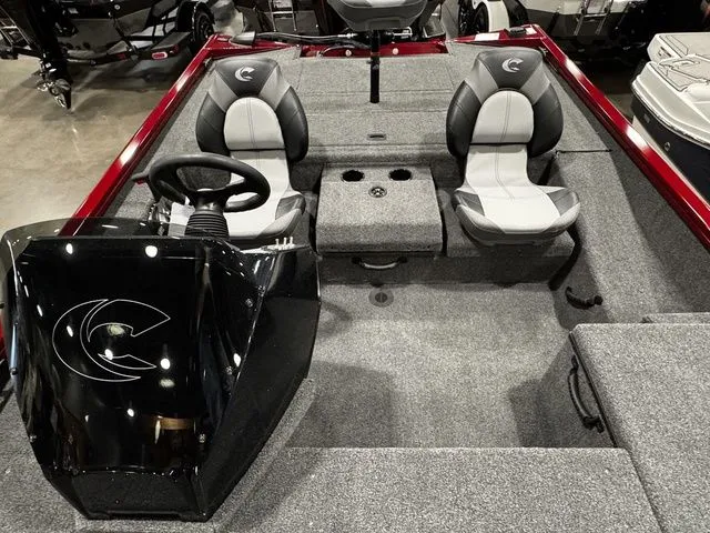 Slide: The Image of 2025 Crestliner XFC 179 boat interior with dual seats and steering console. - 11