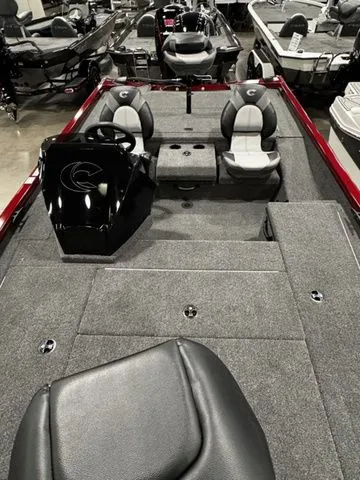 Slide: The Image of 2025 Crestliner XFC 179 fishing boat interior with seating and steering console. - 10