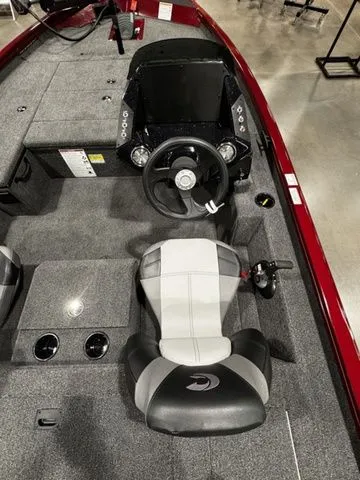 Slide: The Image of 2025 Crestliner XFC 179 boat interior with steering wheel and seating. - 6