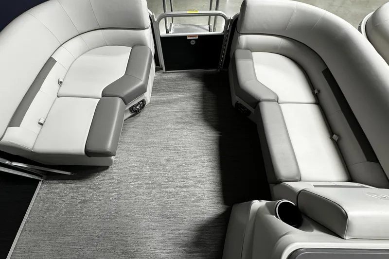 Slide: The Image of Luxurious seating on 2025 Godfrey Xperience 1886 CX pontoon boat interior. - 7