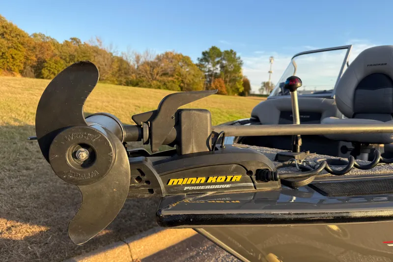 Slide: The Image of 2018 Tracker Targa 18 WT boat with Minn Kota trolling motor in sunlight. - 18