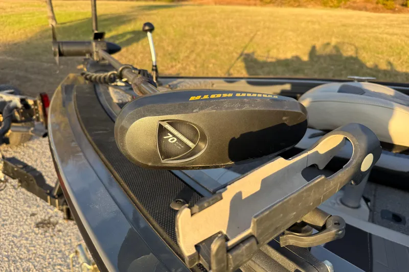 Slide: The Image of 2018 Tracker Targa 18 WT boat on trailer, parked on a scenic road. - 19