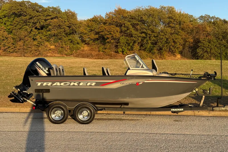Slide: The Image of 2018 Tracker Targa 18 WT boat on trailer with Mercury outboard motor. - 25