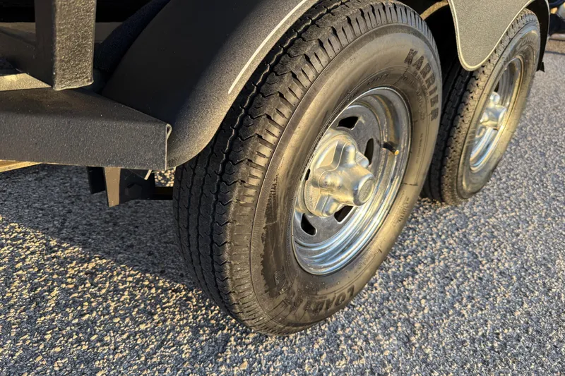 Slide: The Image of 2018 Tracker Targa 18 WT boat interior with seating and windshield. - 32