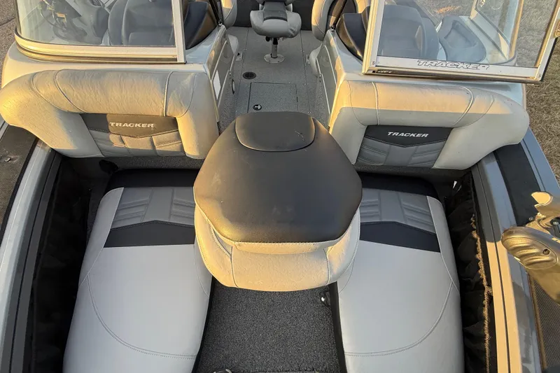 Slide: The Image of 2018 Tracker Targa 18 WT boat interior with cushioned seating and storage. - 36