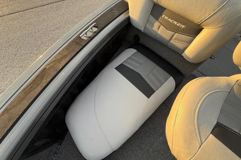 Slide: The Image of Interior of 2018 Tracker Targa 18 WT boat with carpeted flooring and control panel. - 39