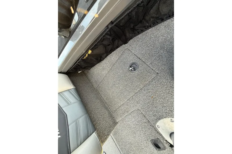 Slide: The Image of 2018 Tracker Targa 18 WT boat storage compartment with control panel. - 41