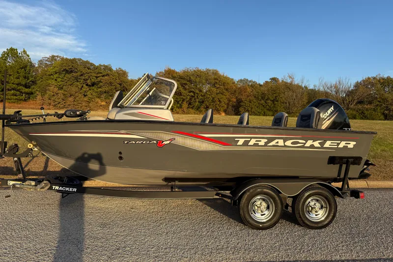 Slide: The Image of 2018 Tracker Targa 18 WT boat on trailer, parked outdoors. - 5
