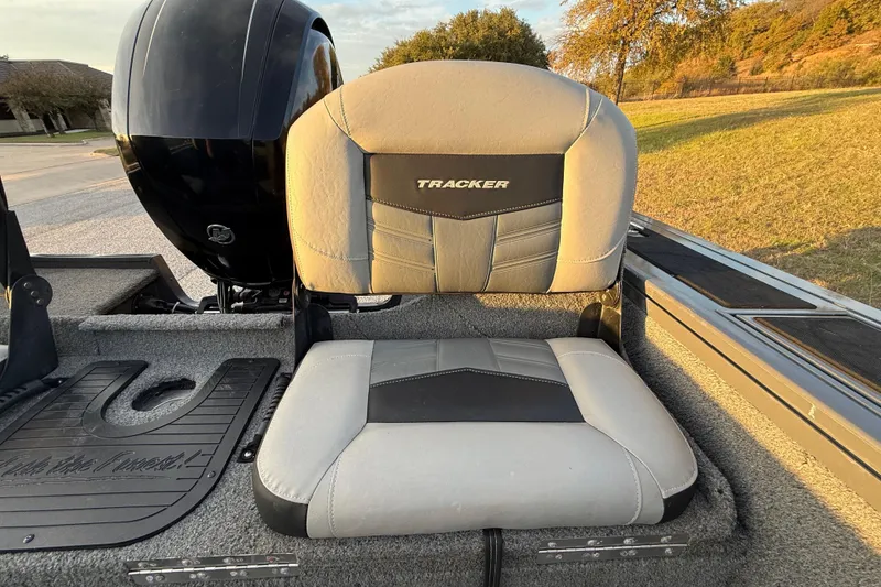 Slide: The Image of 2018 Tracker Targa 18 WT boat interior with dashboard and seating. - 51