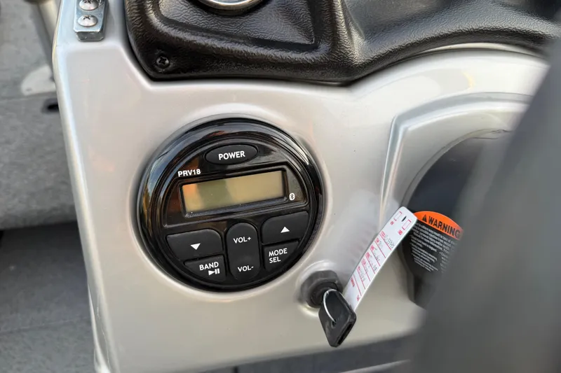 Slide: The Image of Interior of 2018 Tracker Targa 18 WT boat with seating and storage compartments. - 58