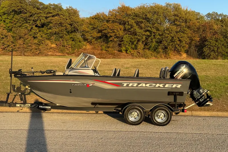 Slide: The Image of 2018 Tracker Targa 18 WT boat with outboard motor on a sunny day. - 6
