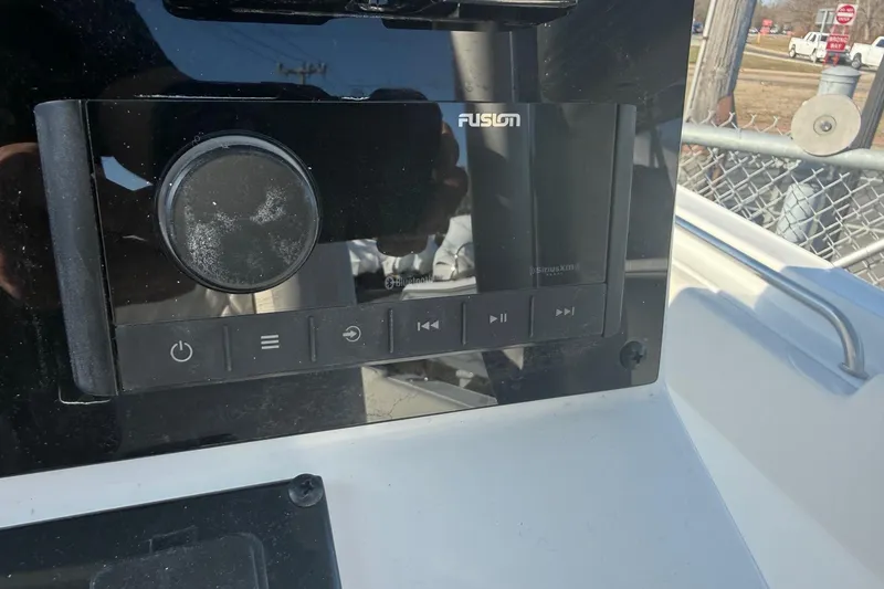 Slide: The Image of Fusion audio system on 2026 Sea Hunt Ultra 234 boat dashboard. - 16