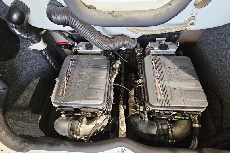 Slide: The Image of 2009 Yamaha Boats 232 Limited engine compartment with dual engines and visible components. - 23