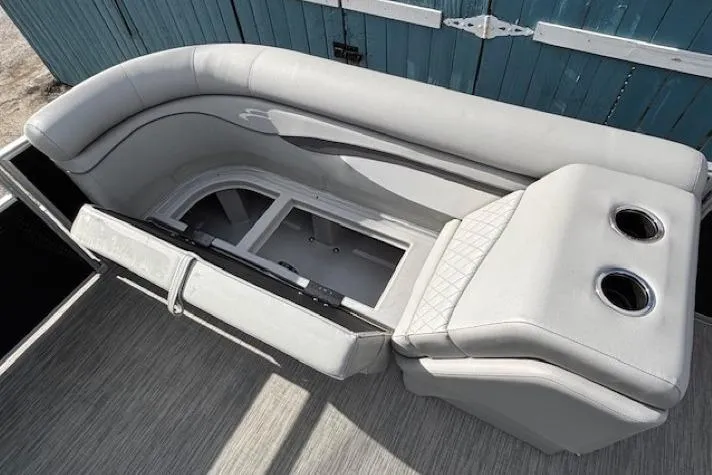 Slide: The Image of 2022 Bennington S 22 Quad Bench with storage compartment and cup holders, gray upholstery. - 13