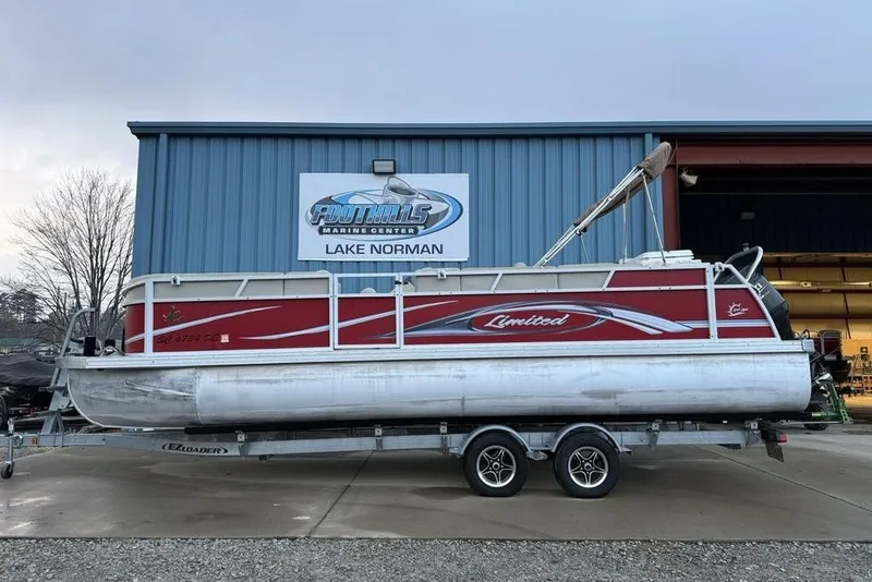 The Image of 2014 JC NepToon 24 Limited pontoon boat on trailer at Foothills Marine Center. - 1