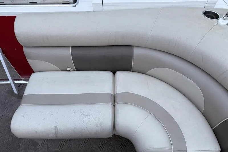 Slide: The Image of 2014 JC NepToon 24 Limited boat seating with beige and gray upholstery. - 23