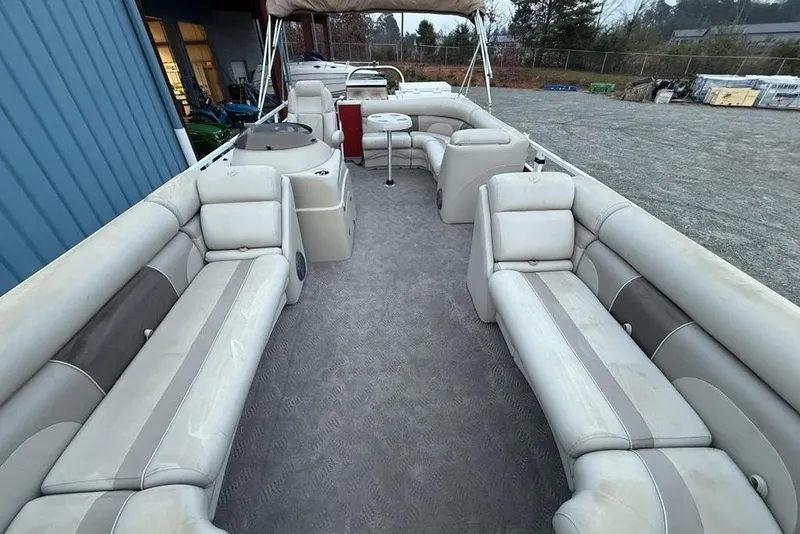 Slide: The Image of 2014 JC NepToon 24 Limited pontoon boat with spacious seating and canopy. - 25
