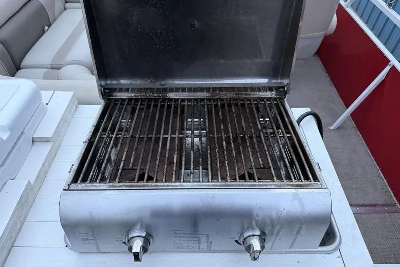 Slide: The Image of Outdoor grill on a JC NepToon 24 Limited pontoon boat, 2014 model. - 28