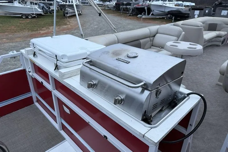 Slide: The Image of Open white cooler on JC NepToon 24 Limited 2014 boat deck. - 26