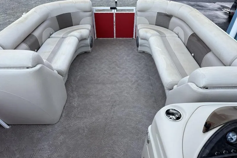 Slide: The Image of 2014 JC NepToon 24 Limited boat seating with beige and gray upholstery. - 9
