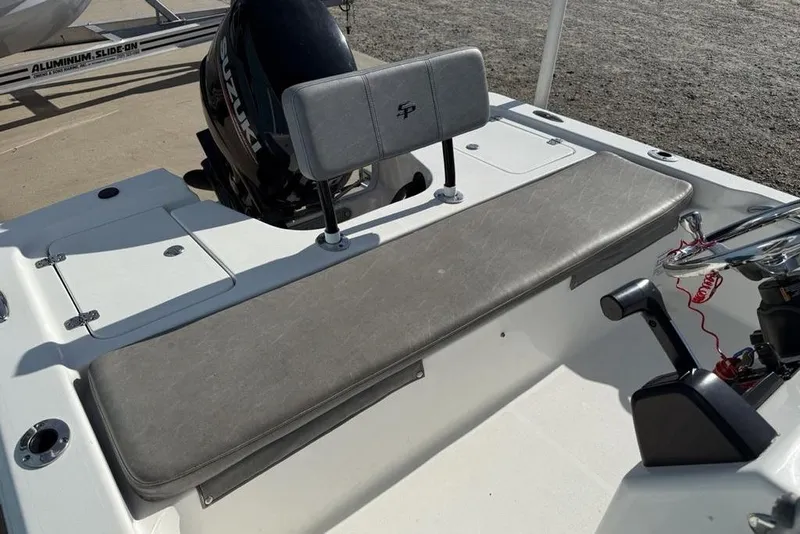 Slide: The Image of 2020 Sea Pro 172 Bay boat interior with Suzuki engine and steering controls. - 18