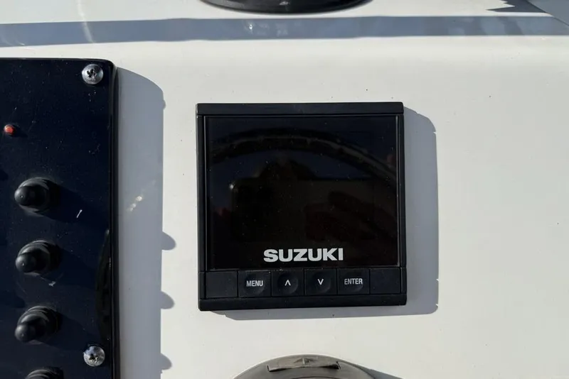 Slide: The Image of Suzuki control panel on 2020 Sea Pro 172 Bay boat dashboard. - 20