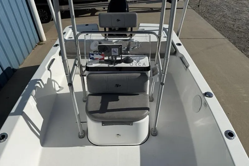 Slide: The Image of 2020 Sea Pro 172 Bay boat interior with seating and console. - 5