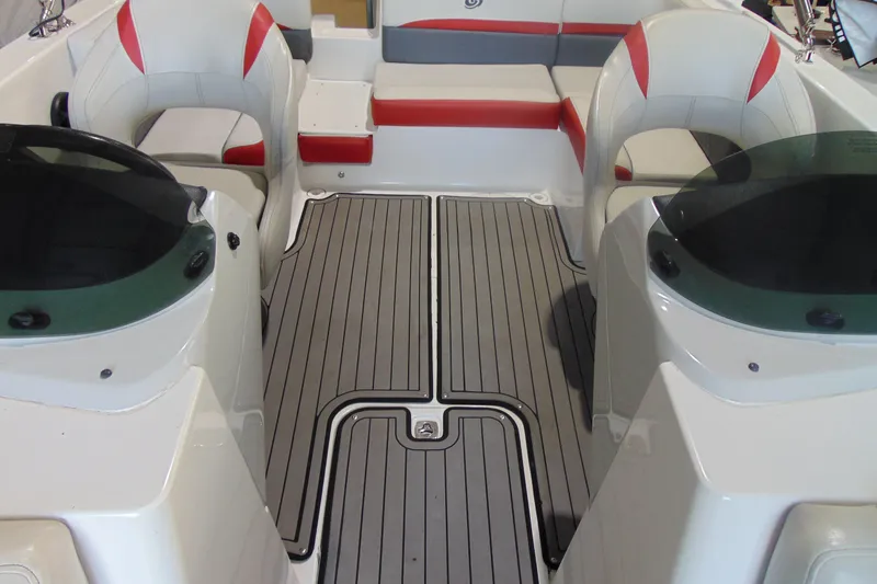 Slide: The Image of 2018 Hurricane SunDeck Sport 192 OB interior with seating and deck view. - 11