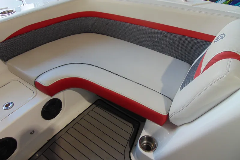 Slide: The Image of 2018 Hurricane SunDeck Sport 192 OB boat interior with red and gray seating. - 14