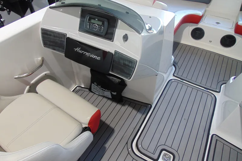 Slide: The Image of 2018 Hurricane SunDeck Sport 192 OB boat interior with modern dashboard and seating. - 6