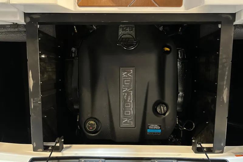Slide: The Image of 2026 Malibu Wakesetter 23 LSV engine compartment with Monsoon engine visible. - 18