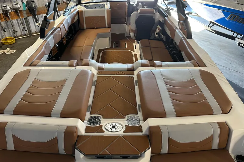 Slide: The Image of 2026 Malibu Wakesetter 23 LSV interior with luxurious brown and white seating. - 3
