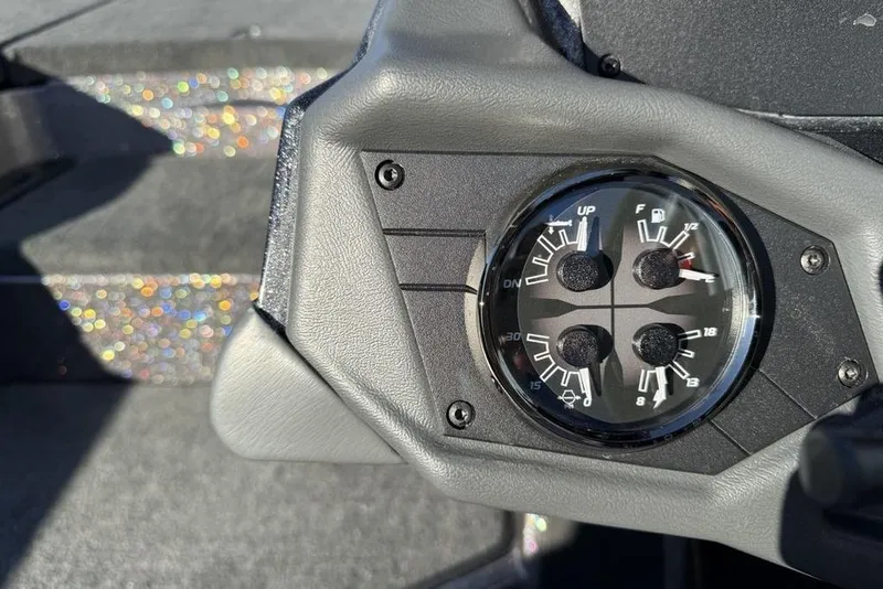 Slide: The Image of Dashboard of 2026 Skeeter ZXE20 boat with gauges and controls. - 15