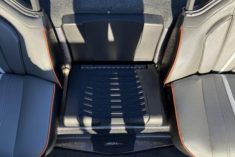 Slide: The Image of 2026 Skeeter ZXE20 boat interior with gray seats and orange trim. - 17