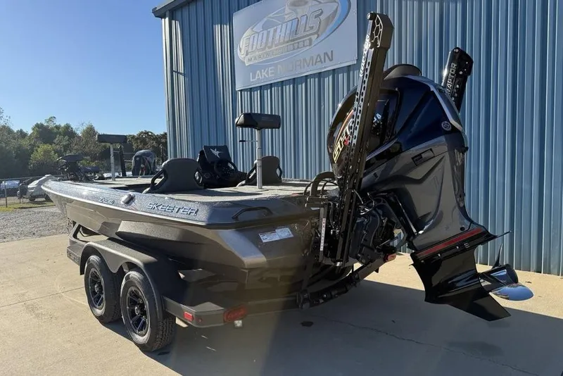 Slide: The Image of 2026 Skeeter ZXE20 boat with powerful engine at dealership. - 8