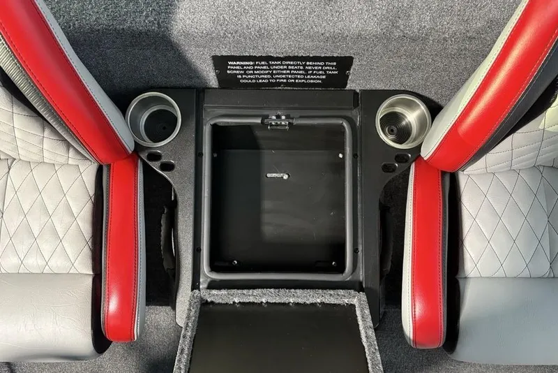 Slide: The Image of Interior of 2026 Phoenix 721 ZXL with red and gray seats, cup holders, and storage compartment. - 18