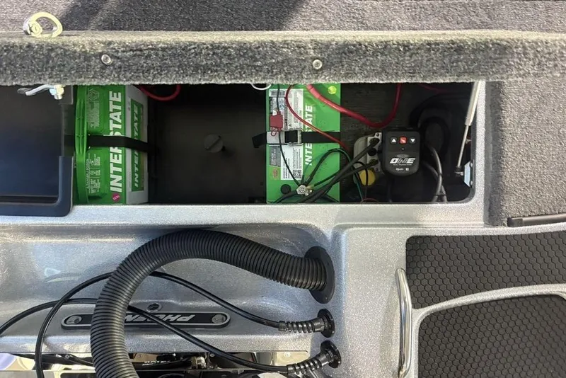 Slide: The Image of Battery compartment of 2026 Phoenix 721 ZXL boat with Interstate batteries and wiring. - 31