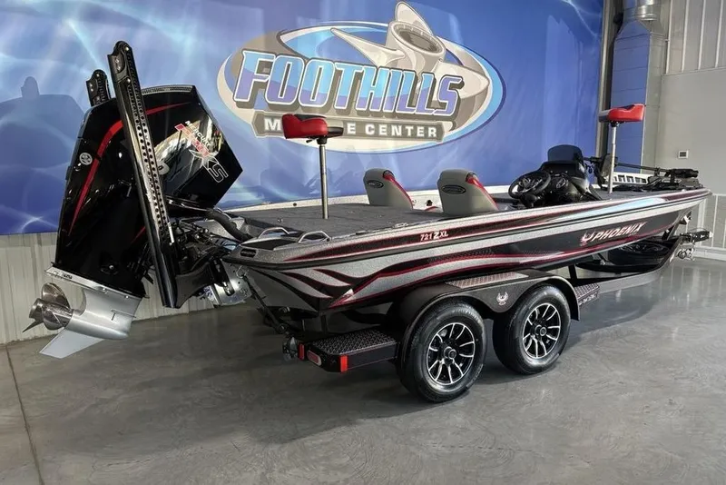 Slide: The Image of 2026 Phoenix 721 ZXL boat at Foothills Marine Center showroom. - 6