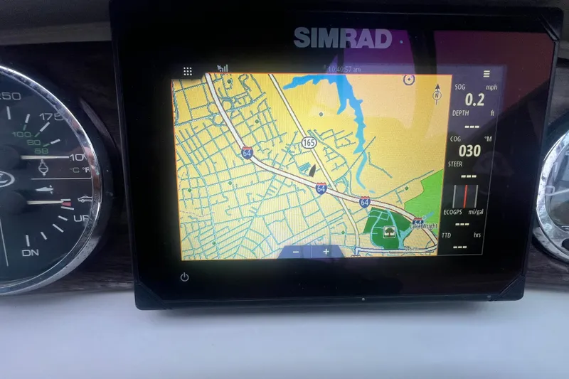 Slide: The Image of Simrad GPS display on 2005 Sea Ray 270 Sundeck, showing navigation map and speedometer. - 30